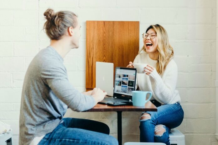 Two people discussing first home